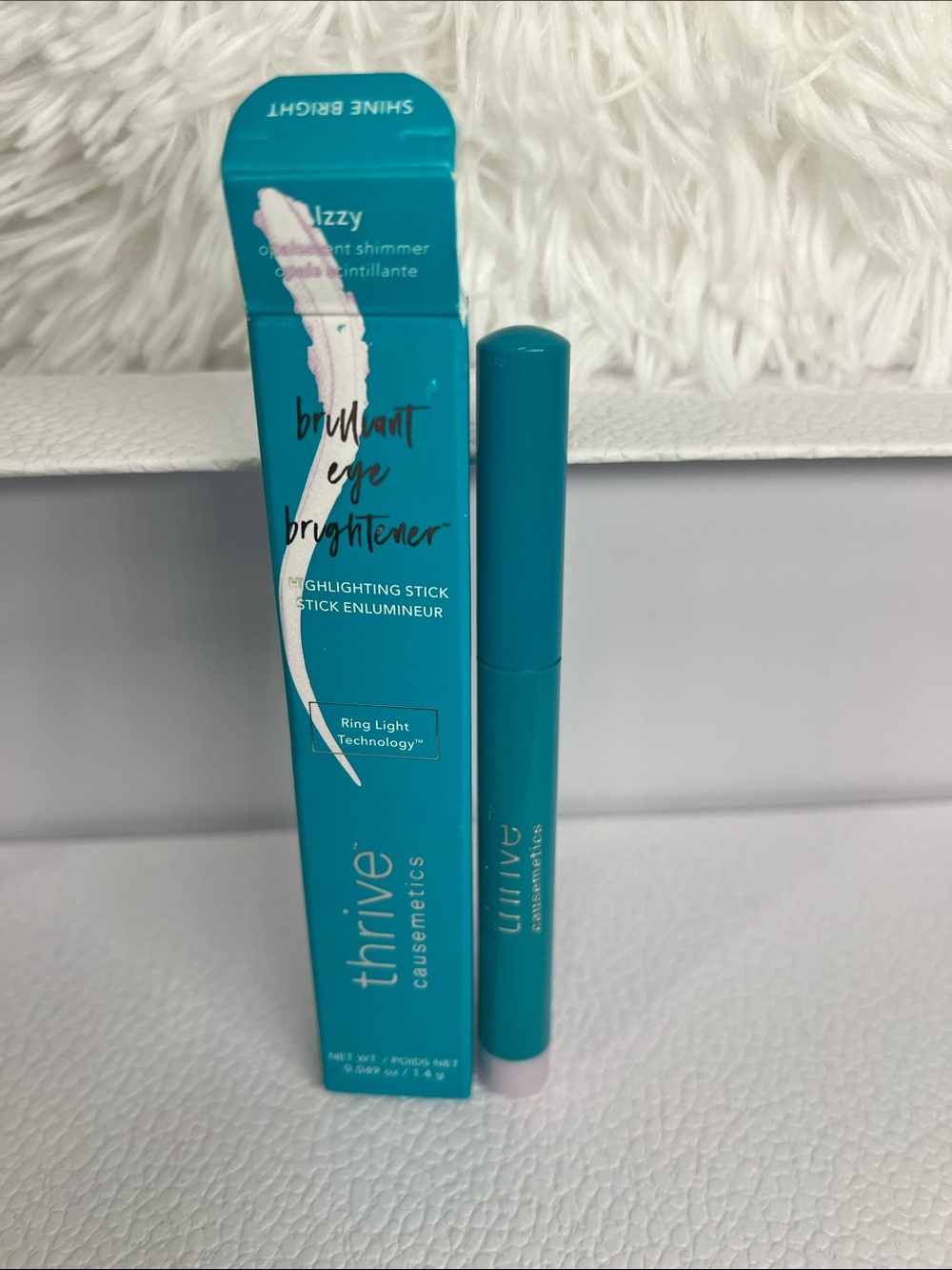 Thrive Causemetics: Brilliant eye brightener highlighting eyeshadow stick izzy